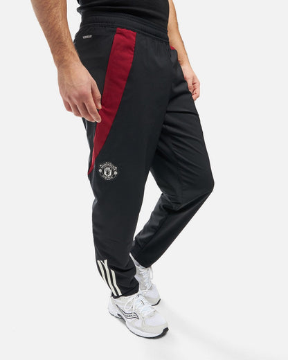 Pantalon de survêtement Manchester United 2024/2025 - Noir/Rouge