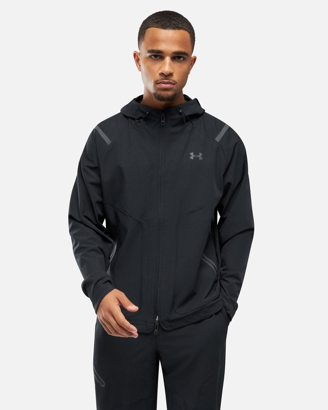 Chaqueta Under Armour Running Unstoppable en el pecho izquierdo - Negra